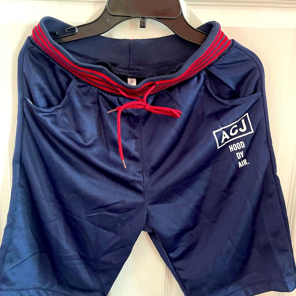 Boy, blue shorts, size medium